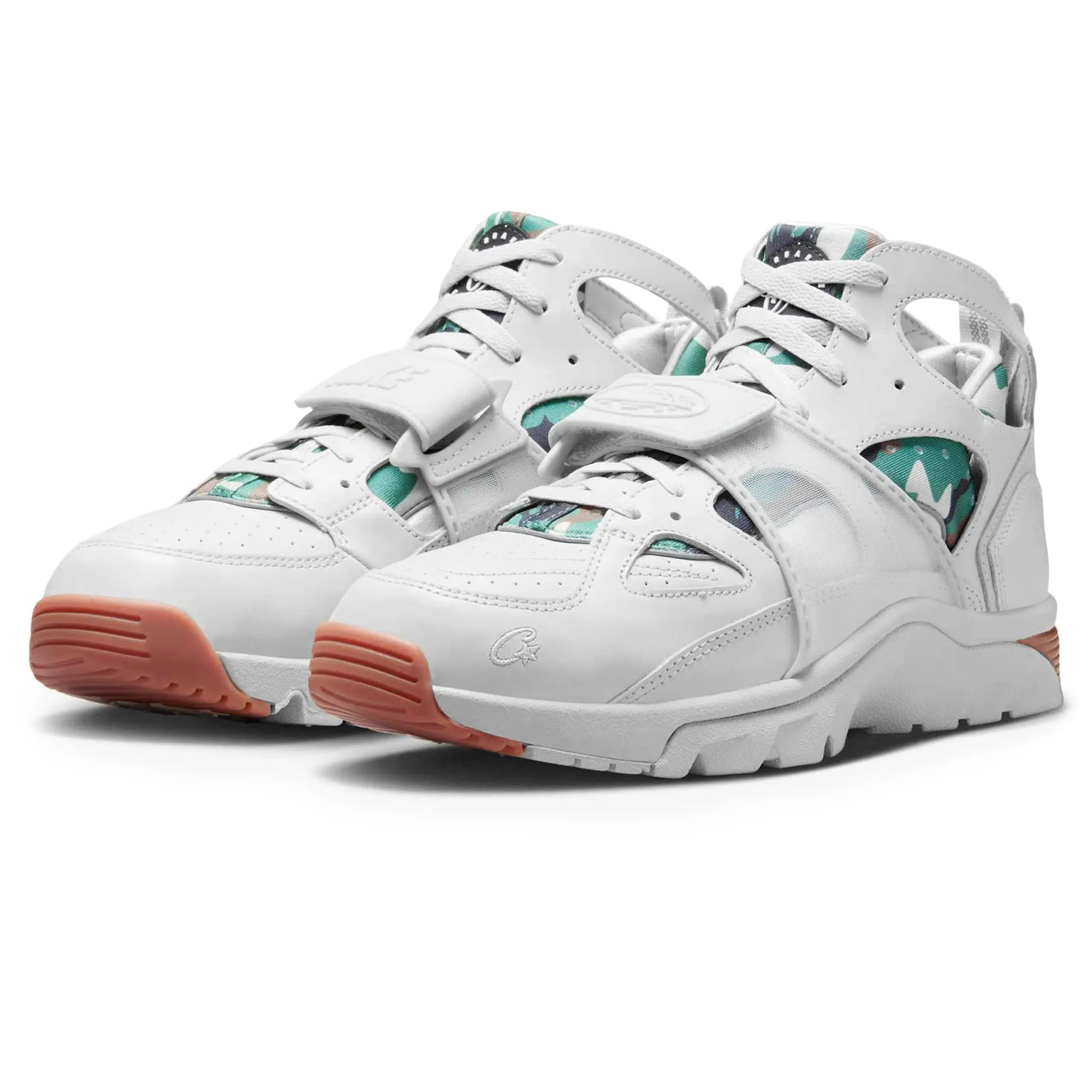 Front side view of Corteiz x Nike Air Huarache Light Bone